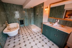 An elegant bathroom suite at The Ashford Arms